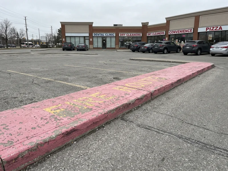 Before fire route marking: faded lines in Toronto