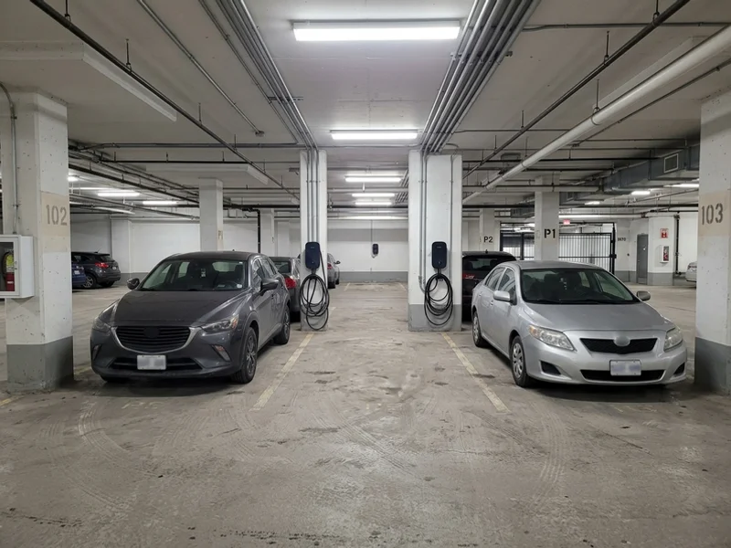 Before ev charging markings: faded lines in Toronto