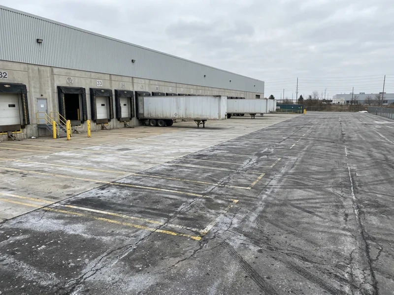 Before loading dock marking: faded lines in Toronto